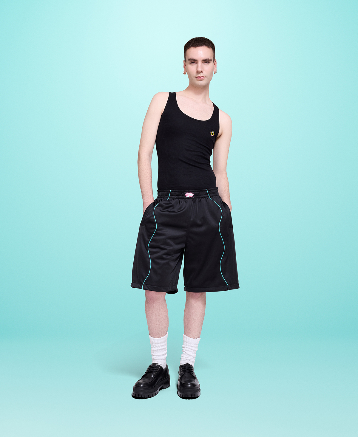 Unisex Black Bermuda Shorts – Mint Wavy Detail (front)
