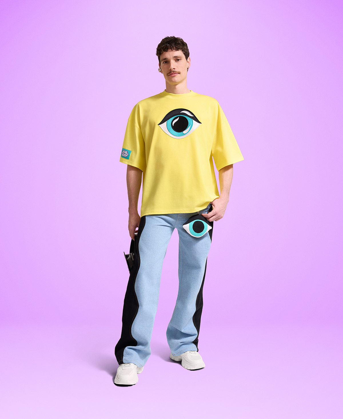 Yellow T-Shirt with Embroidered Eye with jeans Yellow T-Shirt with Embroidered Eye with jeans